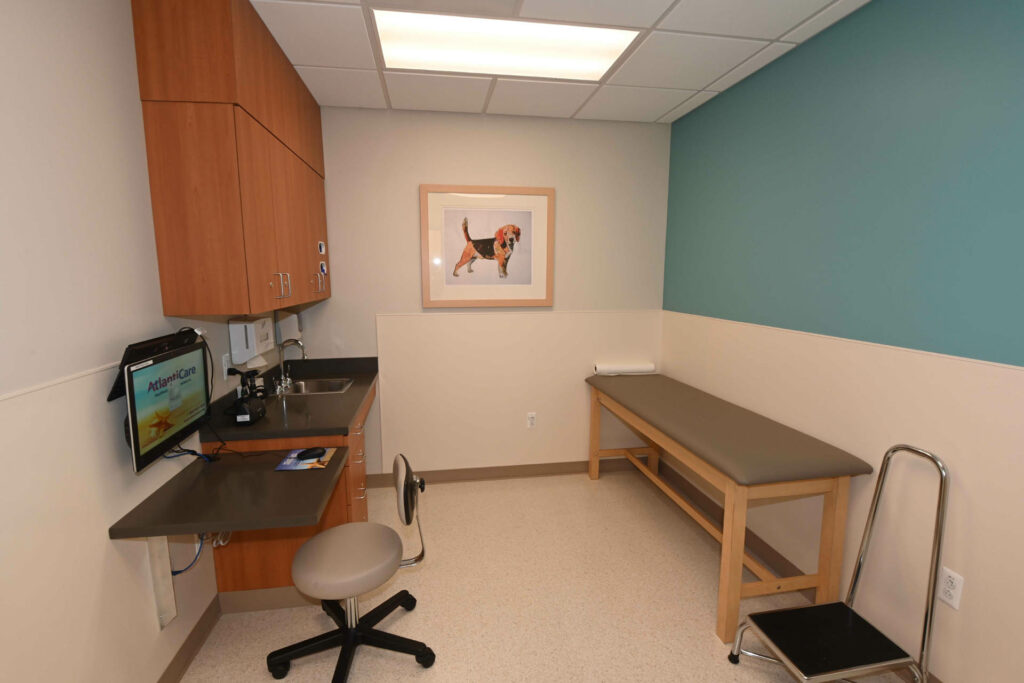 Healthcare office exam room with table